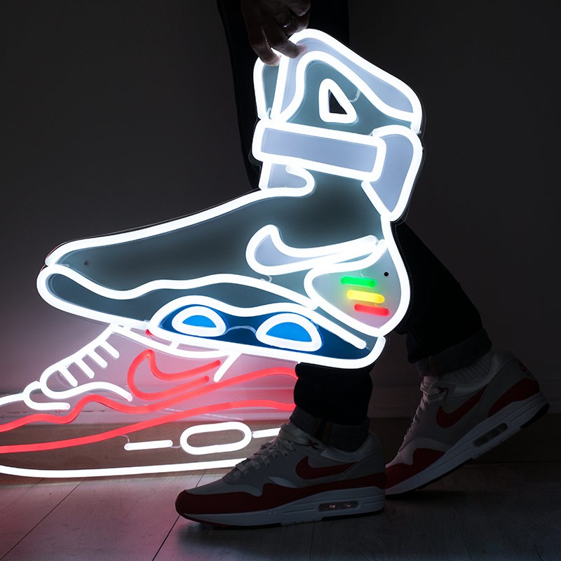 white and neon nikes