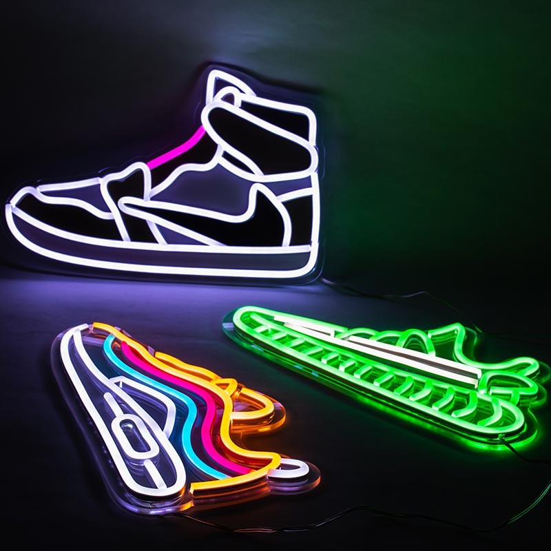 Premium Photo | A neon light is lit up on a shoe that says nike.